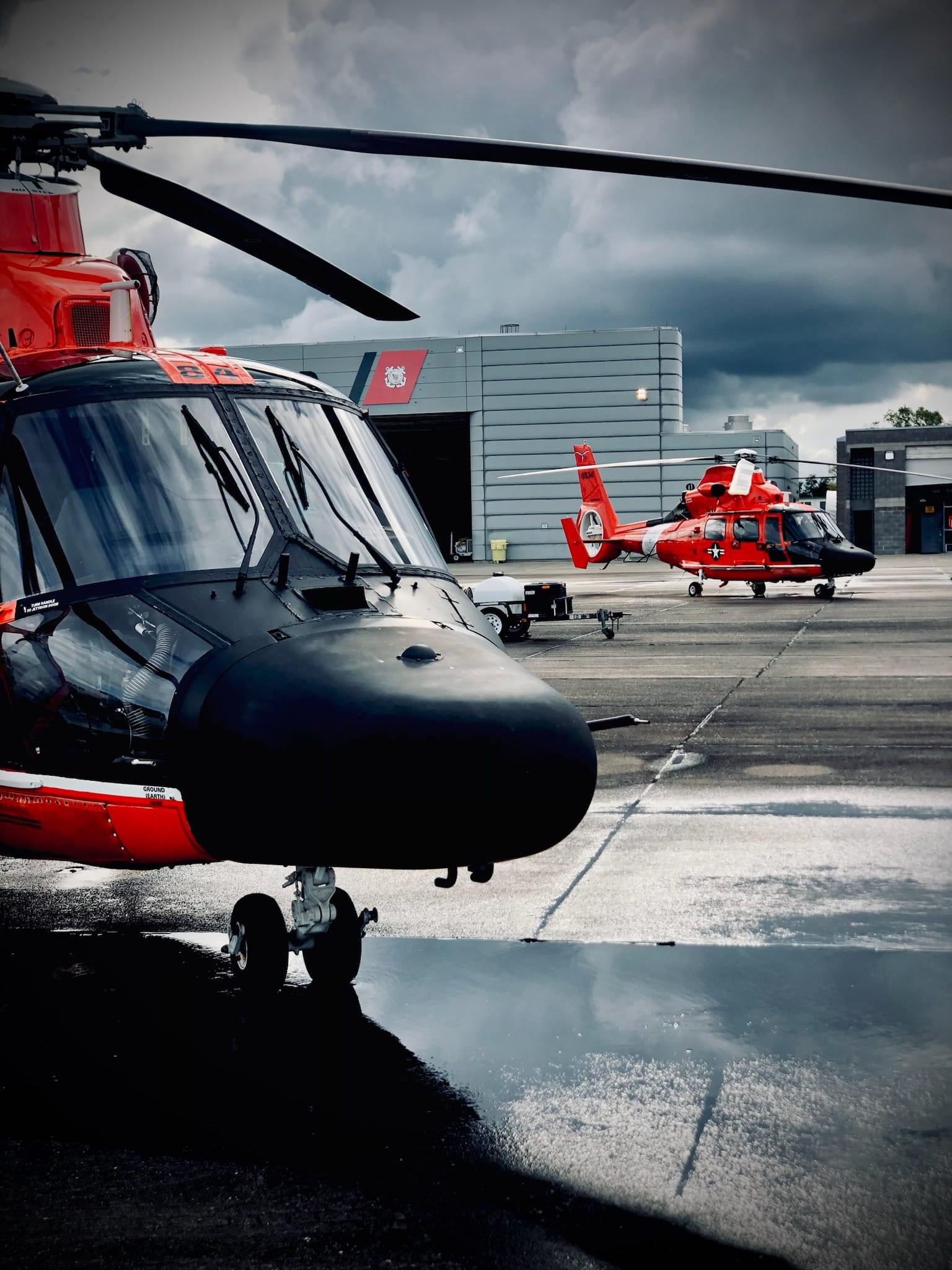MH-65 helicopters outside the Air Station Houston hangar